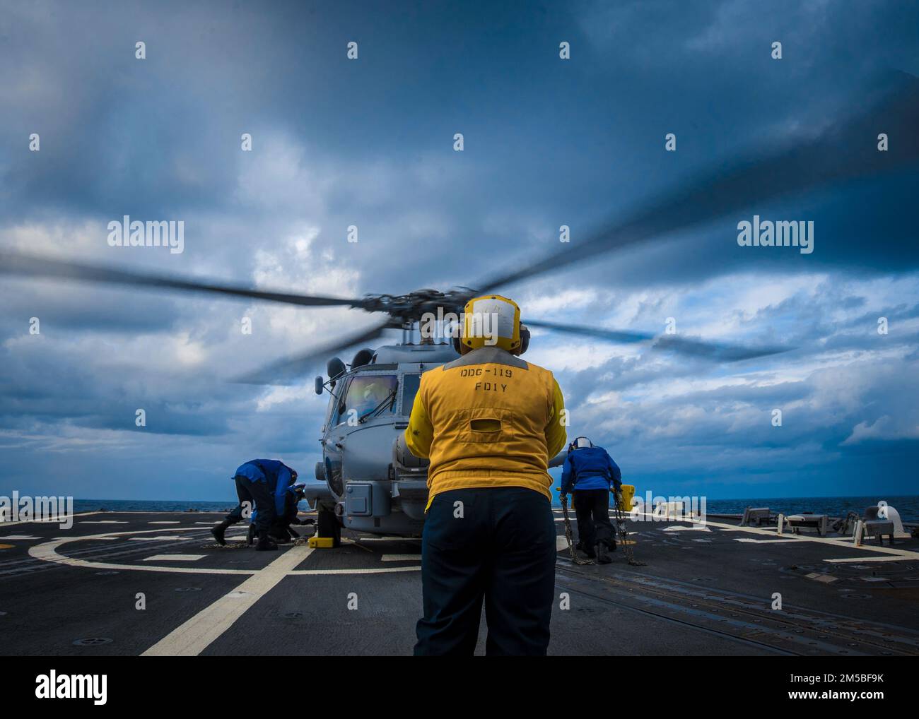 Sailors aboard the guided missile destroyer USS Delbert D. Black (DDG ...