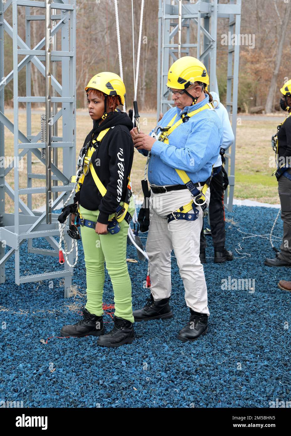 220222-N-OH262-0430--FORT EUSTIS, Va. (February 22, 2022)-- Newly hired Civil Service Mariners (CIVMAR) demonstrates the proper use of safety gear to transit aloft aboard a ship; while they were attending Basic Training at Military Sealift Command Training Center East on Joint Base Langley-Fort Eustis, Virginia, Feb. 22. The training was part of the MSC Fall Protection curriculum, which must be successfully completed prior to sailing in MSC's fleet of ships. Stock Photo
