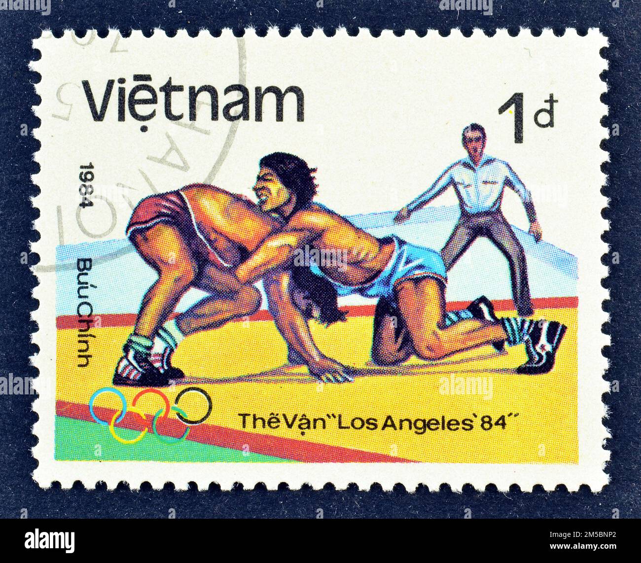 Cancelled postage stamp printed by Vietnam, that shows Wrestling