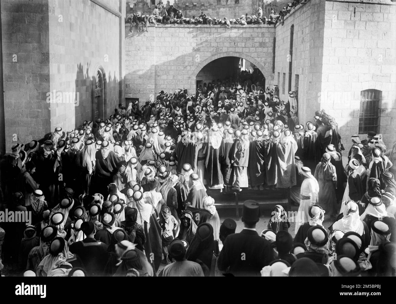Crowds in the street during the British High Commissioner first visit to Transjordan, in Es-Salt on 20th August 1920 Stock Photo