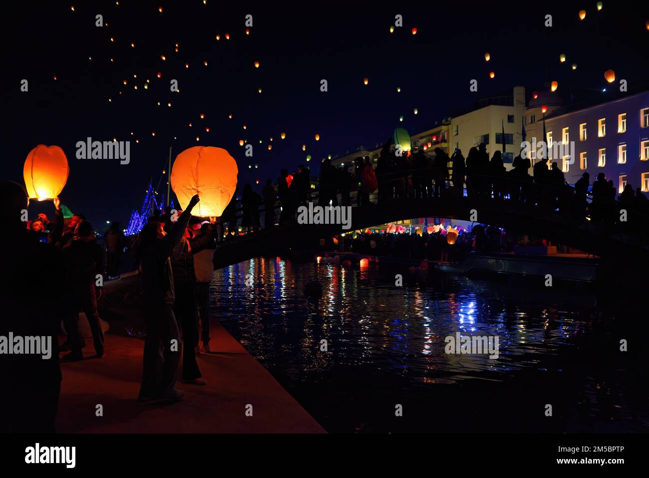 Sky lanterns floating in the sky. Volos lights festival. colorful