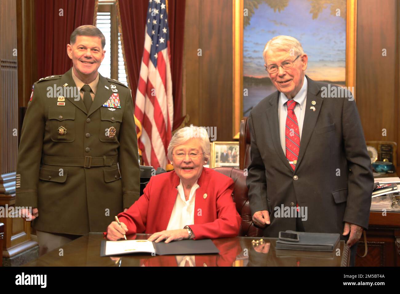 Redstone Arsenal Senior Commander Lt. Gen. Donnie Walker and Alabama Representative Howard Sanderford join Governor Kay Ivey as she declares Feb. 24 “Military Appreciation Day” in Ala. Stock Photo