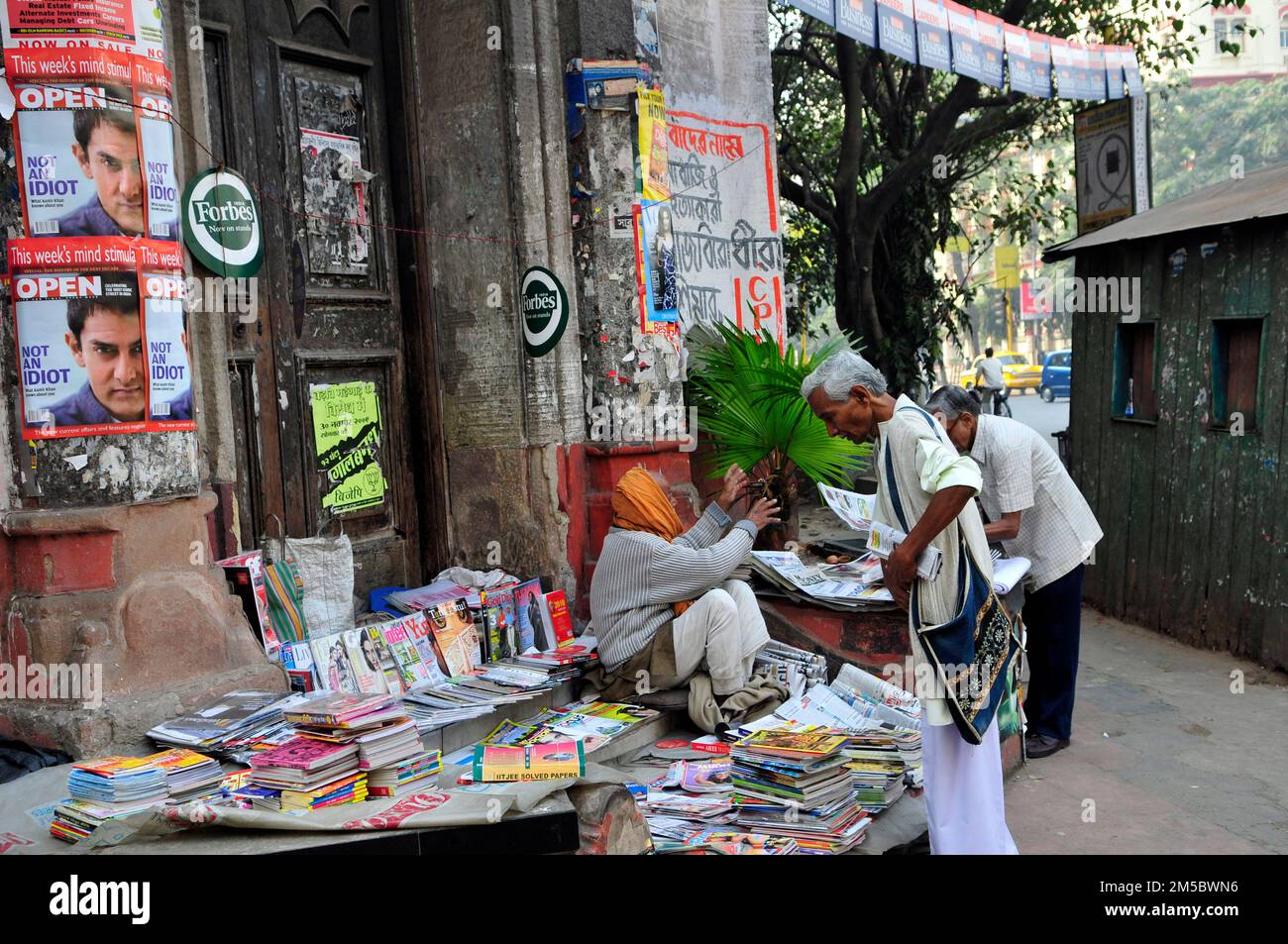 A Newspaper vendor in Esplanade, Kolkata, India. Stock Photo