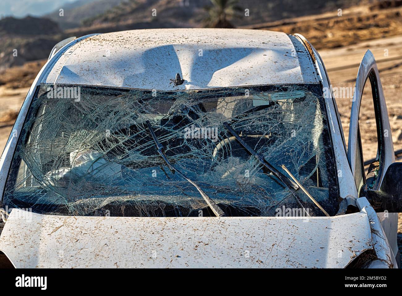 Car, shattered windscreen, total loss after flood, flood damage after flood disaster in Almeria, storm 2012, Andalusia, Spain Stock Photo