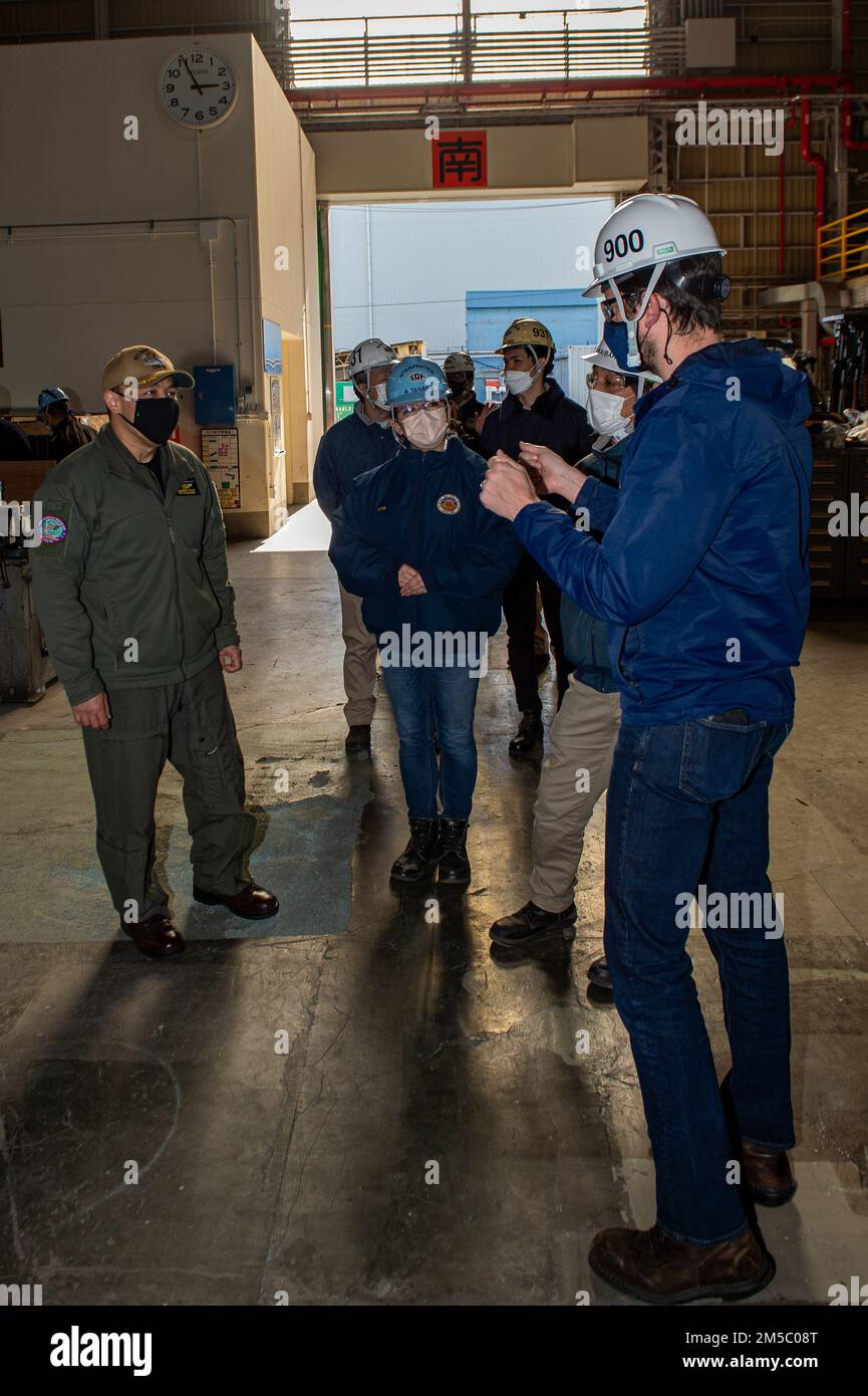 220225-N-SI601-1105 YOKOSUKA, Japan (Feb. 25, 2022) Capt. Fred Goldhammer, commanding officer of the U.S. Navy’s only forward-deployed aircraft carrier USS Ronald Reagan (CVN 76), receives a tour of a warehouse onboard Commander, Fleet Activities Yokosuka. Ronald Reagan, the flagship of Carrier Strike Group 5, provides a combat-ready force that protects and defends the United States, and supports alliances, partnerships and collective maritime interests in the Indo-Pacific region. Stock Photo