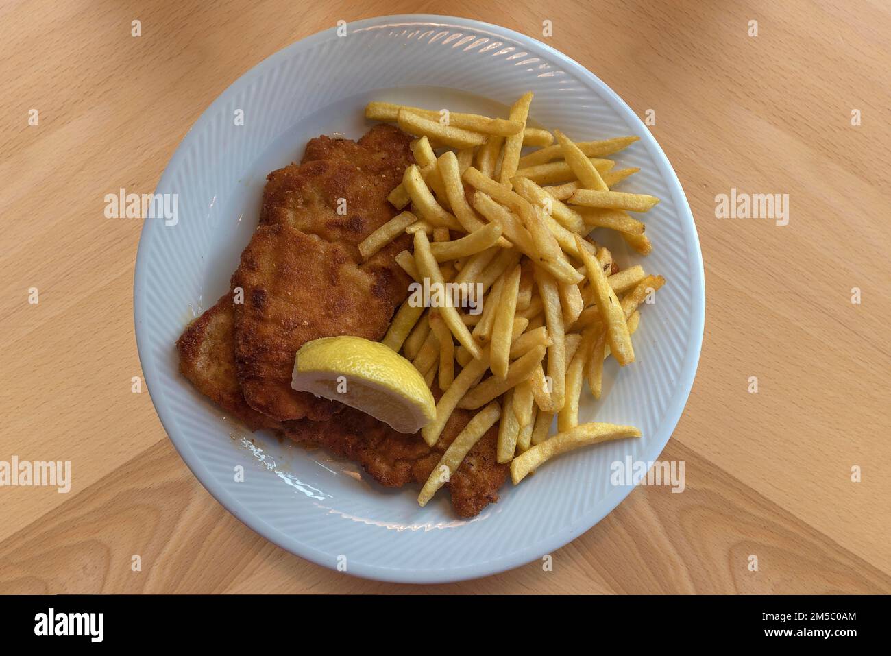 Wiener Schnitzel with french fries, Franconia, Bavaria, Germany Stock
