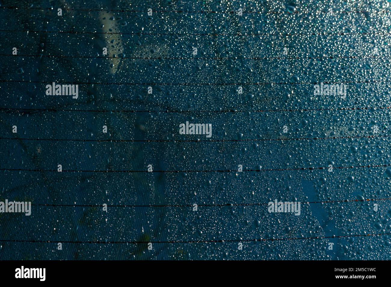 Condensation or water drops on the car rear windshield in the winter Stock Photo