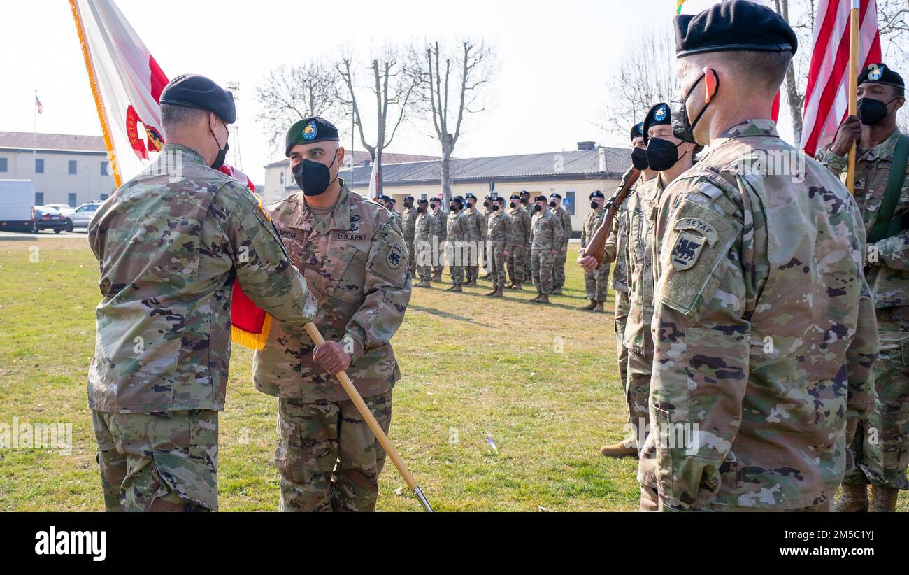 The U.S. Army Southern European Task Force, Africa, Headquarters and Headquarters Battalion conducts a change of responsibility between Command Sgt. Maj. Christopher E. Rozmarin and Command Sgt. Maj. Salvador G. Garcia held at Caserma Ederle, Vicenza, Italy, Feb. 25, 2022.  (U.S. Army Photos by Staff Sgt. Solomon Abanda) Stock Photo