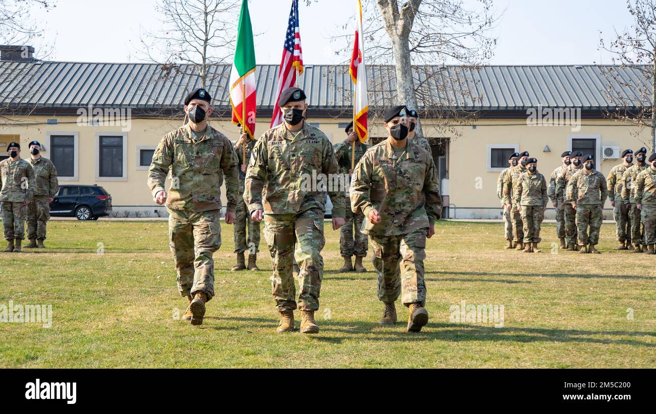 Left to right, Command Sgt. Maj. Christopher E. Rozmarin, LT. Col. John Baker, and Command Sgt. Maj. Salvador G. Garcia walking back after the passing of the colors during the U.S. Army Southern European Task Force, Africa Headquarters and Headquarters Battalion change of responsibility held at Caserma Ederle, Vicenza, Italy, Feb. 25, 2022.    (U.S. Army Photos by Staff Sgt. Solomon Abanda) Stock Photo