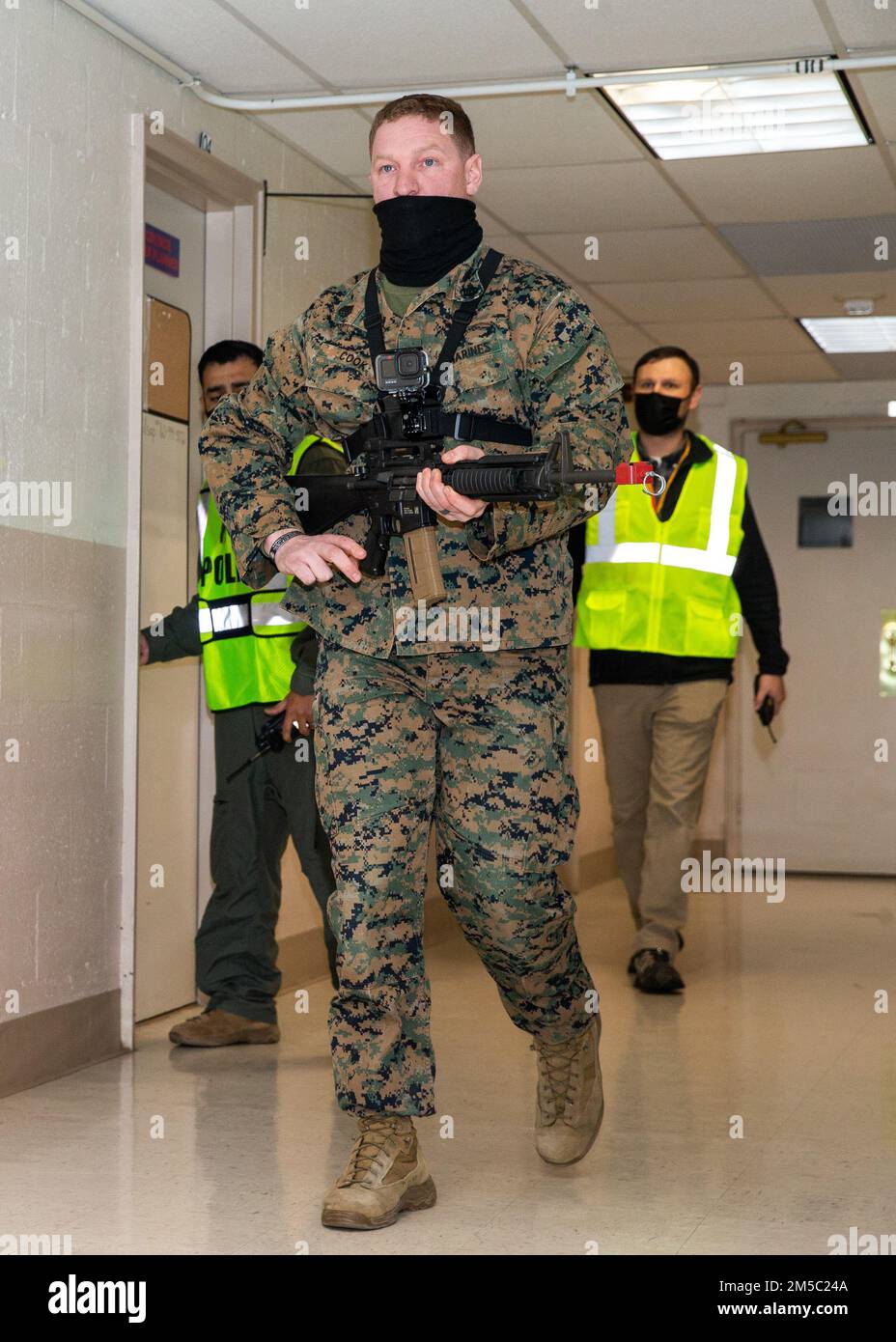 U.S. Marine Corps Staff Sgt. Adam J. Cook, a military police officer ...