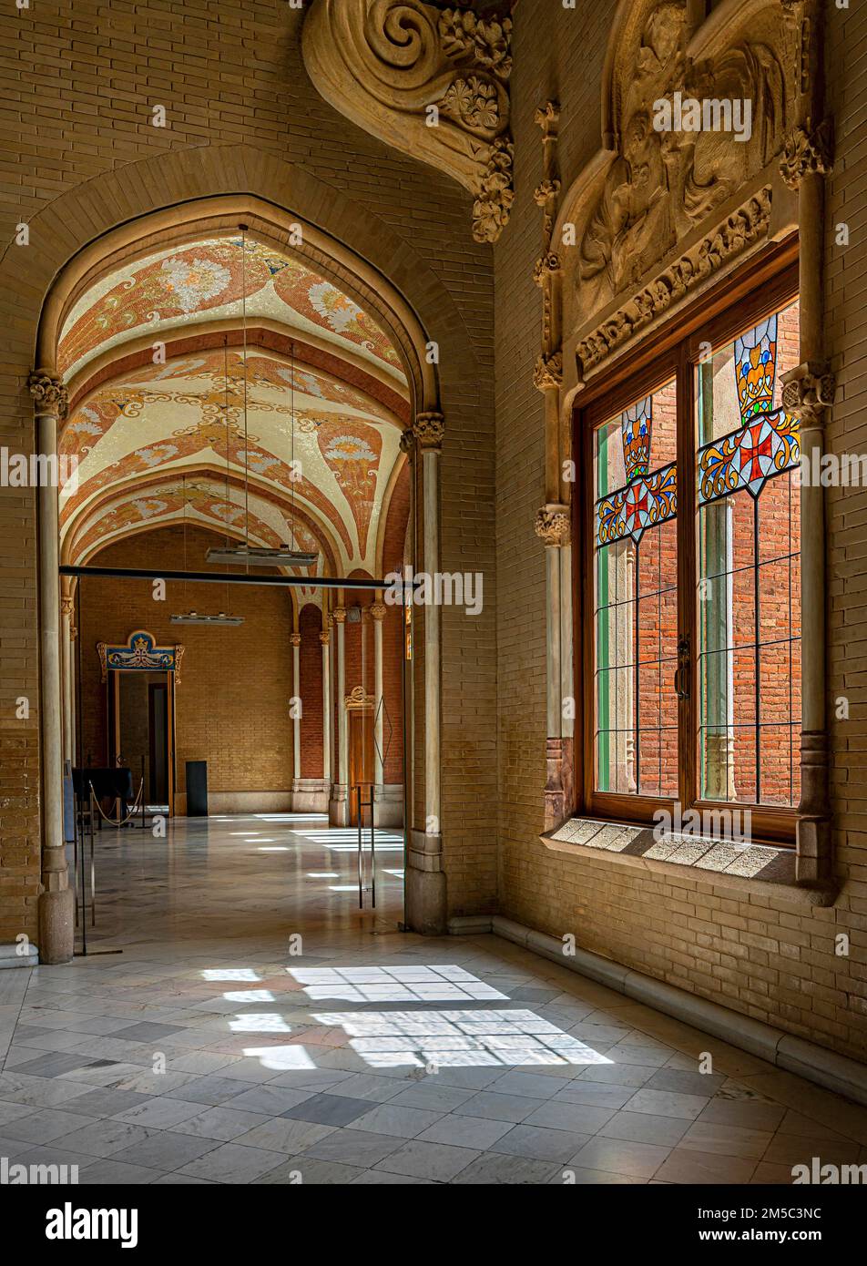 Interior view of the hall and corridors in the main building in the Hospital de la Santa Creu i Sant Pau by architect Lluis Domenech i Montaner Stock Photo