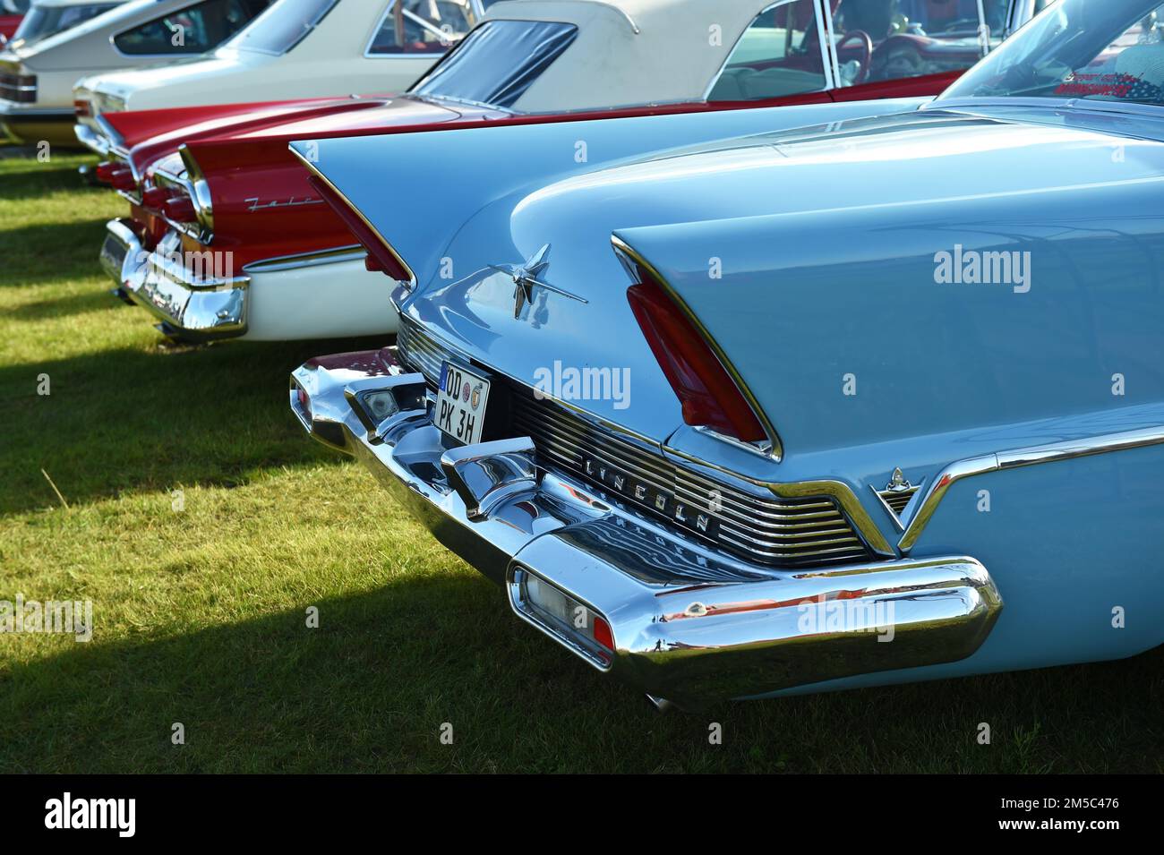Rear view, Lincoln Premiere, and Ford Fairlane 500, Skyliner, at a classic car meeting in Buesum, Germany Stock Photo