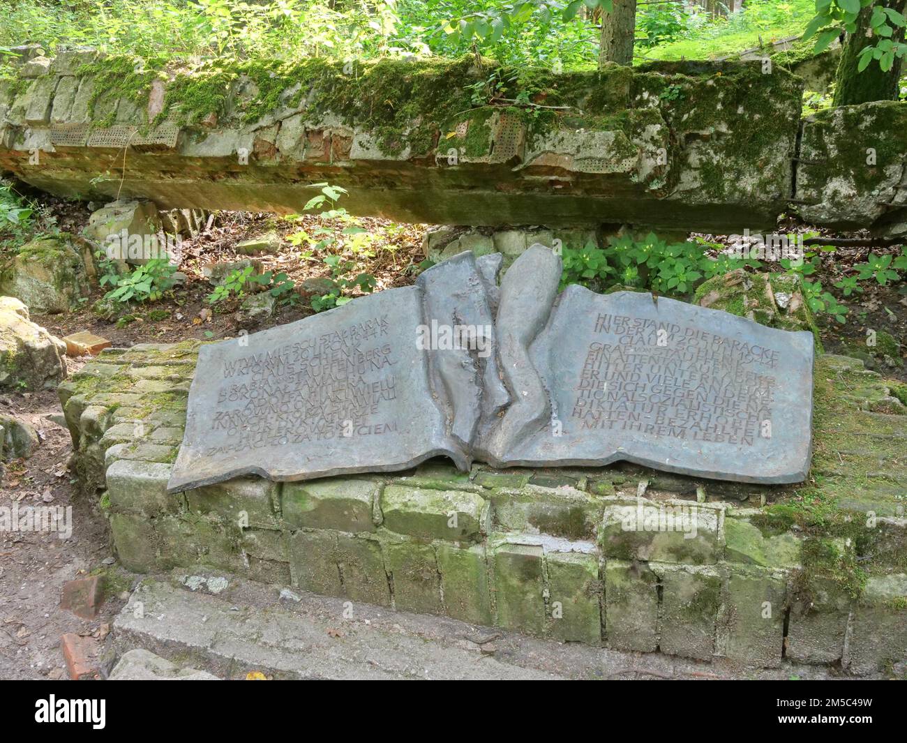 Memorial plaque for the Hitler assassin Claus Schenk Graf von Stauffenberg at the Wolf's Lair (also Wolfschanze or Goerlitz), the military situation Stock Photo