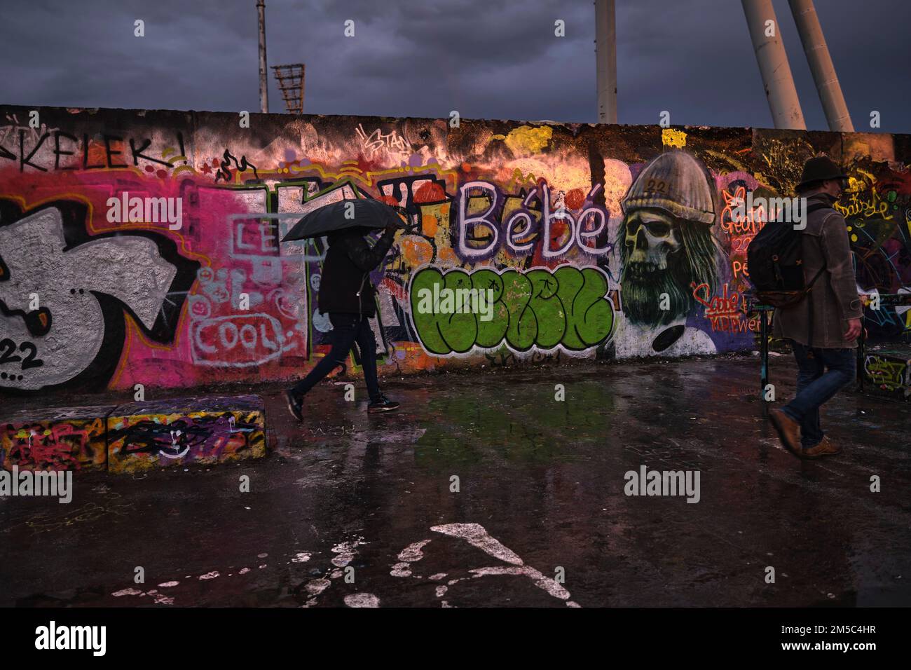 Germany, Berlin, 02. 01. 2022, Sunday afternoon in Mauerpark, graffiti wall, walker, rainy day Stock Photo