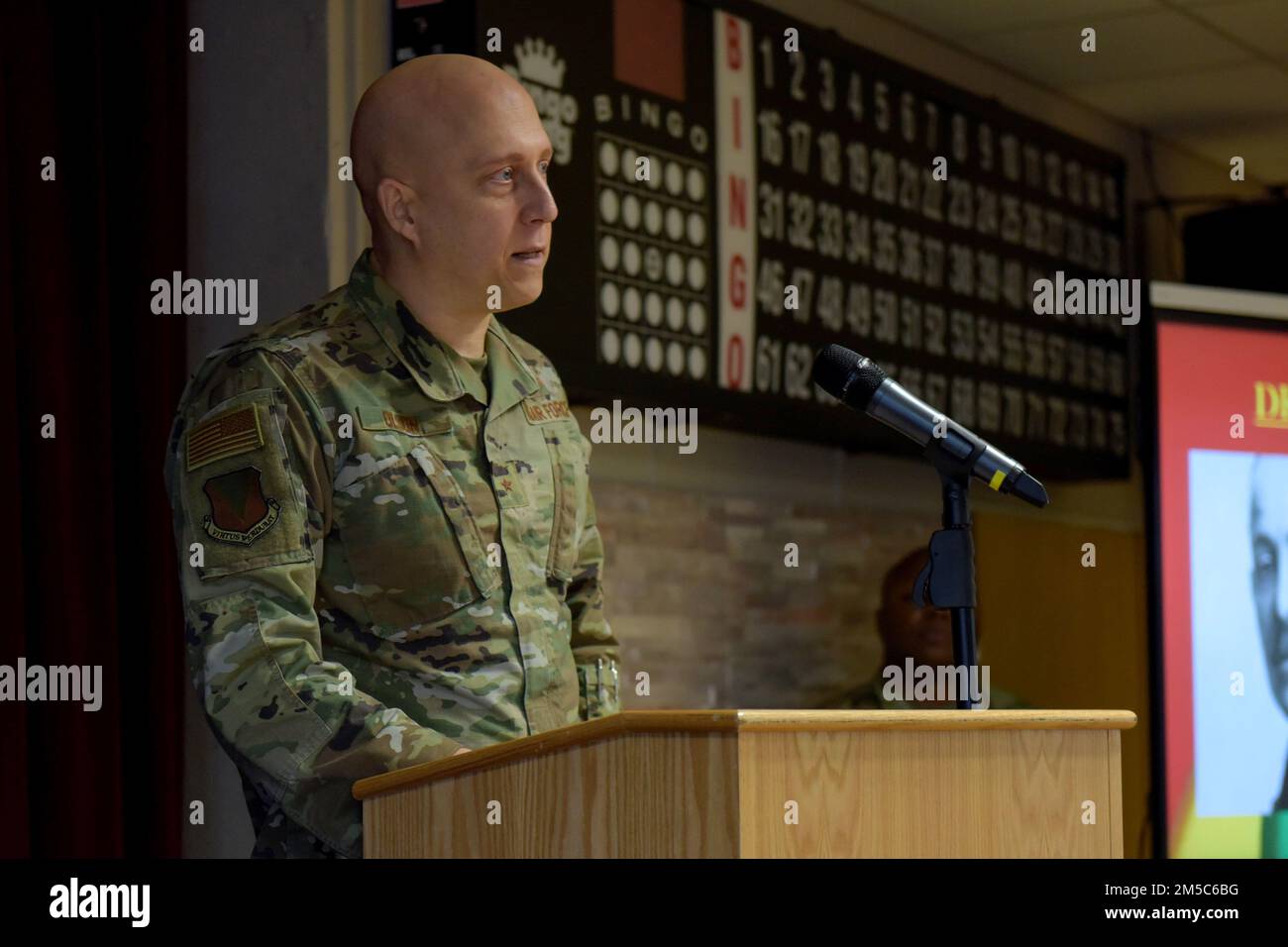 U.S. Air Force Brig. Gen. Josh Olson, 86th Airlift Wing commander, speaks at the Black History Month luncheon hosted at Ramstein Air Base, Germany, Feb. 28, 2022. This year’s BHM theme focused on Black Health and Wellness. Stock Photo