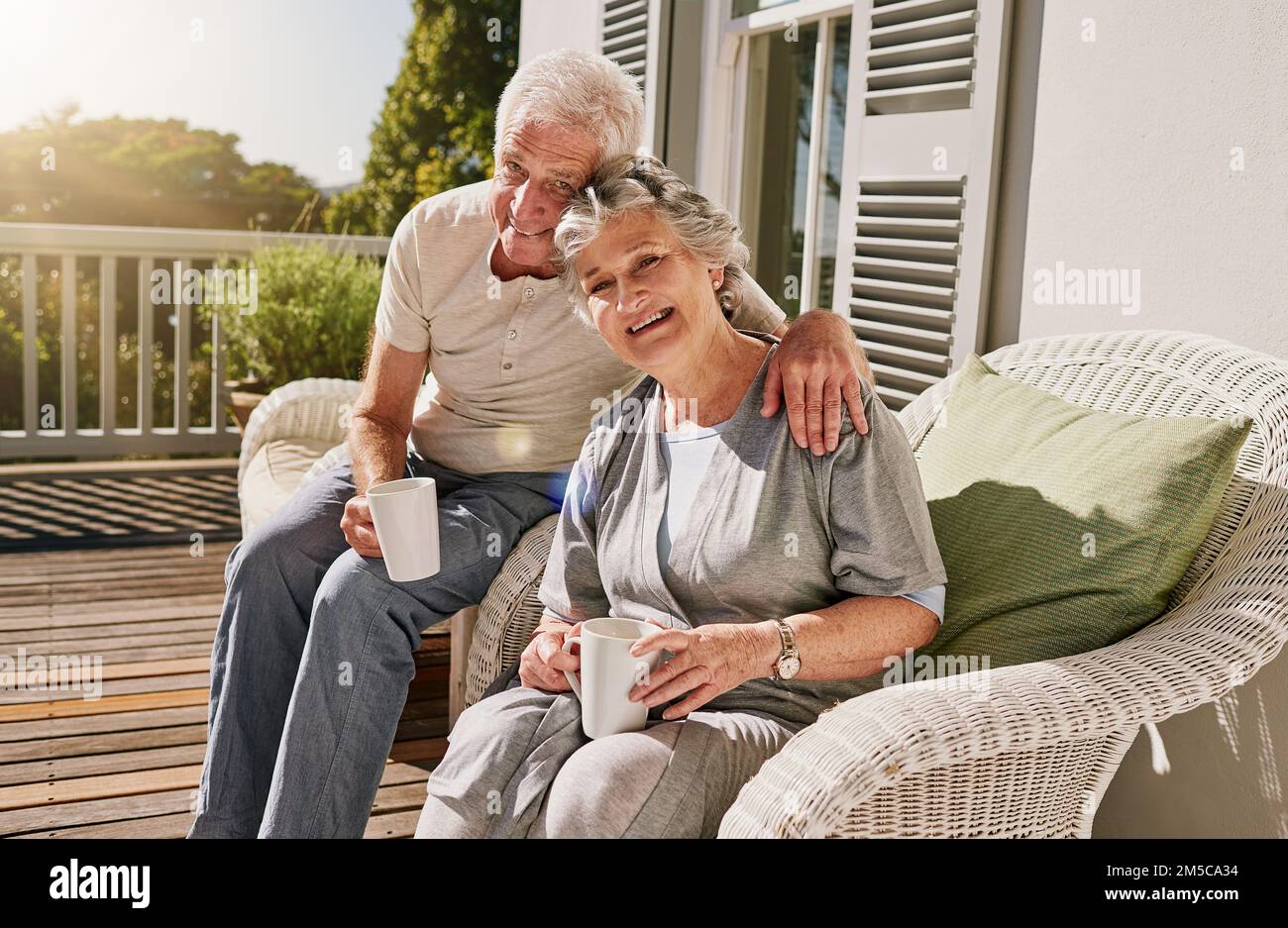 Making our retirement a comfortable one. a happy senior couple enjoying their morning coffee on the patio at home. Stock Photo