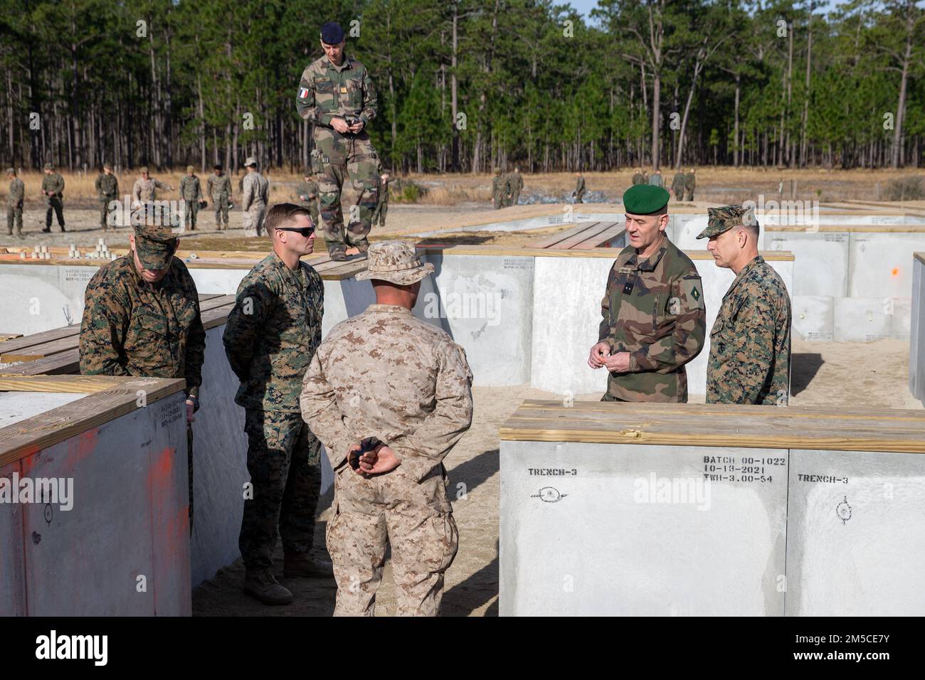 French Army Brig. Gen. Eric Ozanne, the commanding general (CG) of 6th Light Armored Battalion (LAB), speaks to Marines with 2d Marine Division on Camp Lejeune, North Carolina, Mar. 1, 2022. The visit included events on Camp Lejeune and other military installations along the East Coast. The purpose of the engagement was to increase senior leader relationships and to provide the CG of 6th LAB with a better understanding of the Marine Corps’ future combat capabilities and training opportunities. Stock Photo