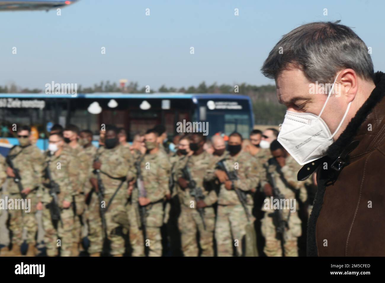 Markus Söder, Minister-President of Bavaria, spoke to arriving Soldiers from 1st Armored Brigade Combat Team, 3rd Infantry Division during a press conference as they touched down in Nuremberg, Germany, Mar. 1, 2022. As announced by the Department of Defense, the unit is deploying to Europe and will be based out of Grafenwoehr Training Area, where they will be issued equipment from Army Prepositioned Stocks-2, and conduct training. Stock Photo