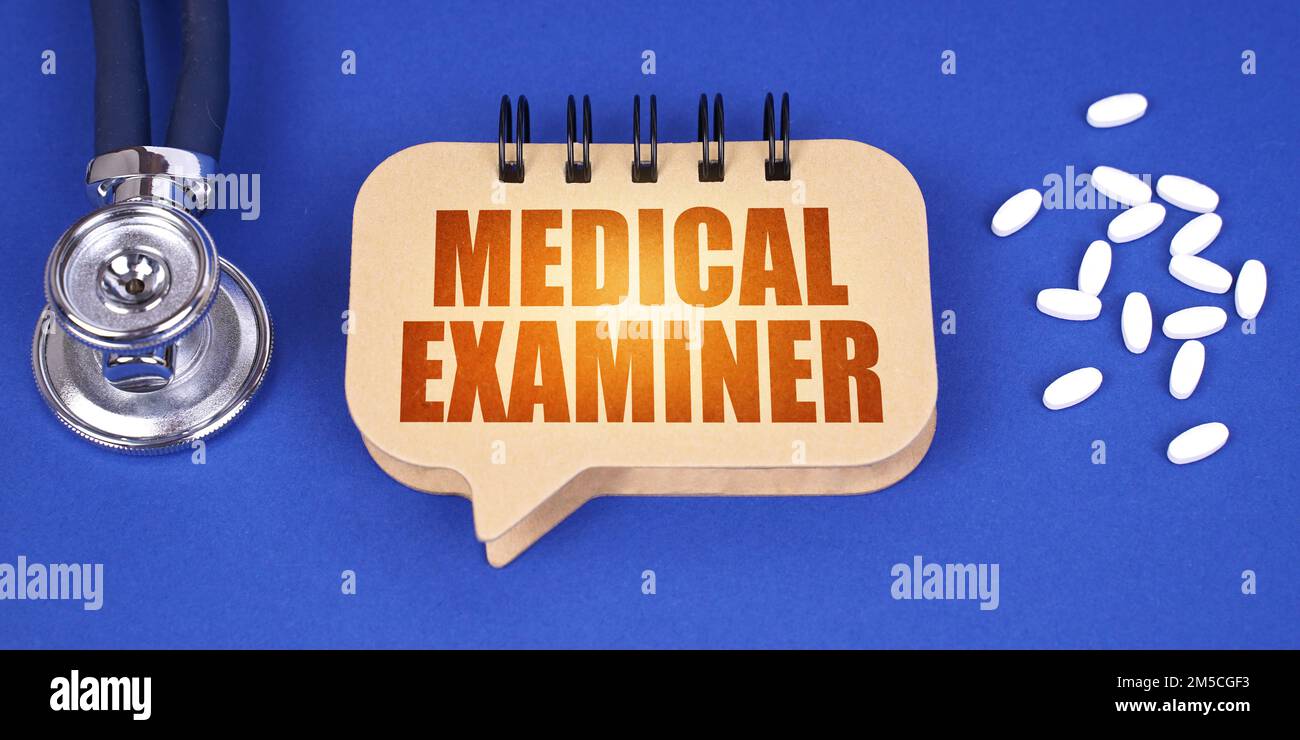 Medical concept. On the blue surface of the tablet, a stethoscope and a notepad with the