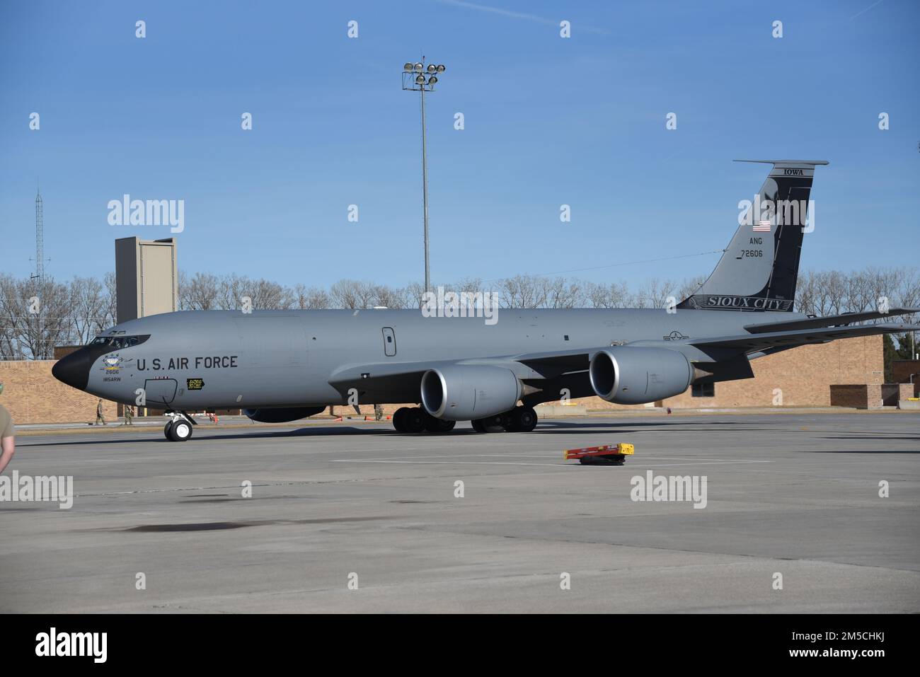 A U.S. Air Force KC-135 with 75th anniversary markings, including a large bat tail flash, tail number 57-2606 from the Iowa Air National Guard taxis on the ramp at the 185th Air Refueling Wing in Sioux City, Iowa on March 1, 2022. The aircraft is due to be decommission and sent to the Aerospace Maintenance and Regeneration Group or AMARG at Davis-Monthon Air Force Base.  U.S. Air National Guard photo Senior Master Sgt. Vincent De Groot 185th ARW Wing PA Stock Photo
