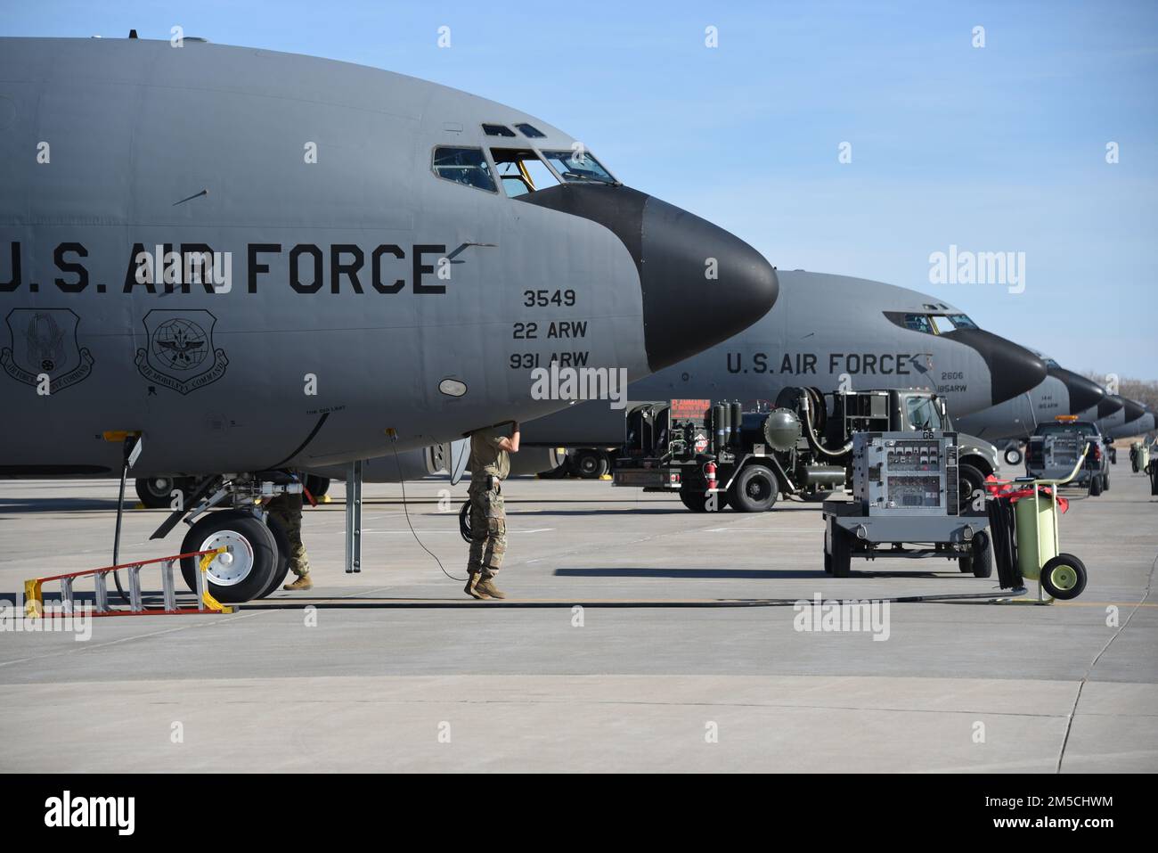 Crew chiefs from the Iowa Air National Guard recover a U.S. Air Force KC-135, tail number 62-3549 on the ramp in Sioux City, Iowa on March 1, 2022. The aircraft has just been transferred from McConnell Air Force Base to the Iowa National Guard.     U.S. Air National Guard photo Senior Master Sgt. Vincent De Groot 185th ARW Wing PA Stock Photo