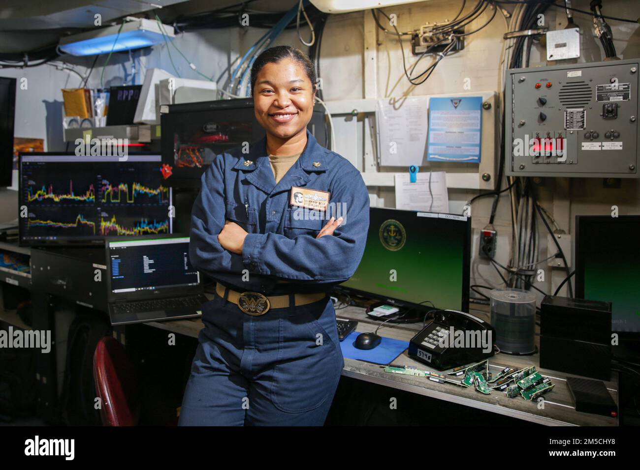 PHILIPPINE SEA (March 1, 2022) Chief Information Systems Technician Maryam Beck, from Mandaluyong, Philippines, poses for an environmental photo aboard the Nimitz-class aircraft carrier USS Abraham Lincoln (CVN 72). Abraham Lincoln Strike Group is on a scheduled deployment in the U.S. 7th Fleet area of operations to enhance interoperability through alliances and partnerships while serving as a ready-response force in support of a free and open Indo-Pacific region. Stock Photo