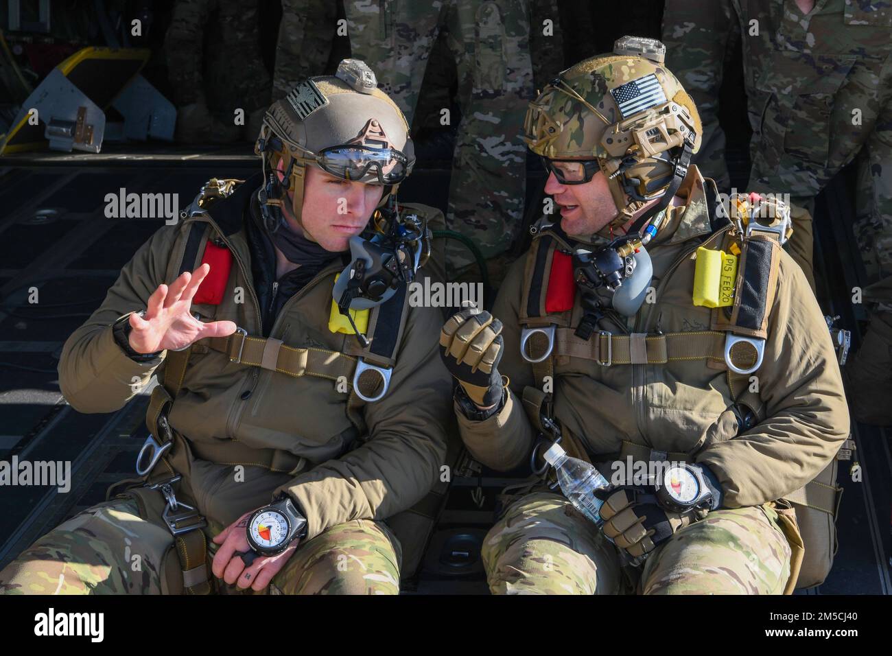 Two U.S. Air Force Airmen assigned to the 57th Rescue Squadron prepare ...