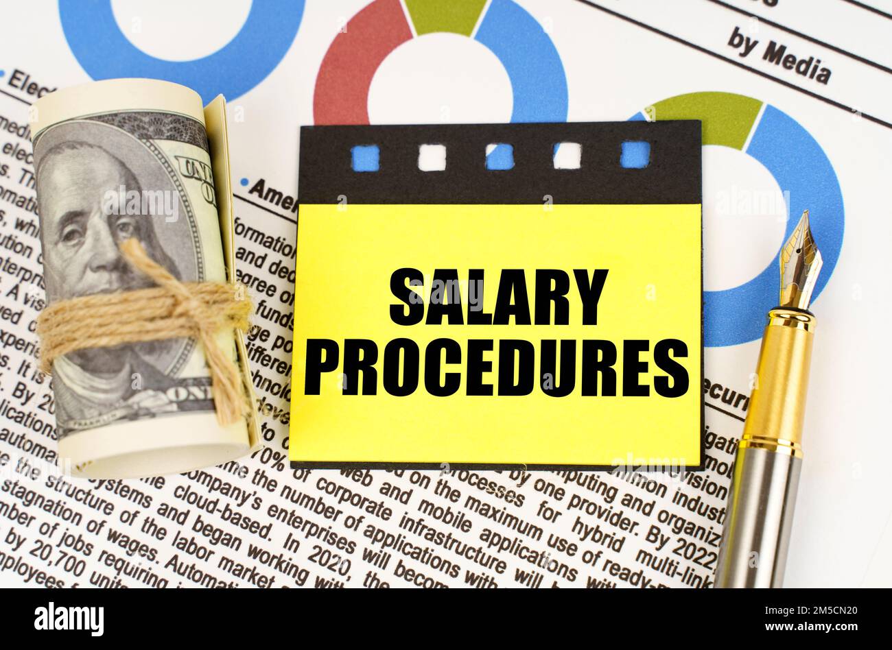 Business concept. On documents with diagrams there are dollars, a pen