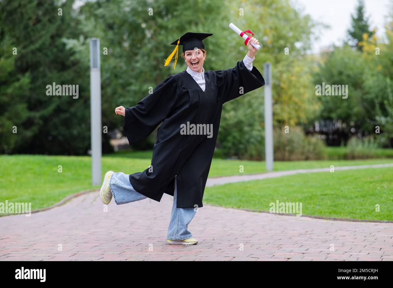 Dancing graduate hi-res stock photography and images - Alamy