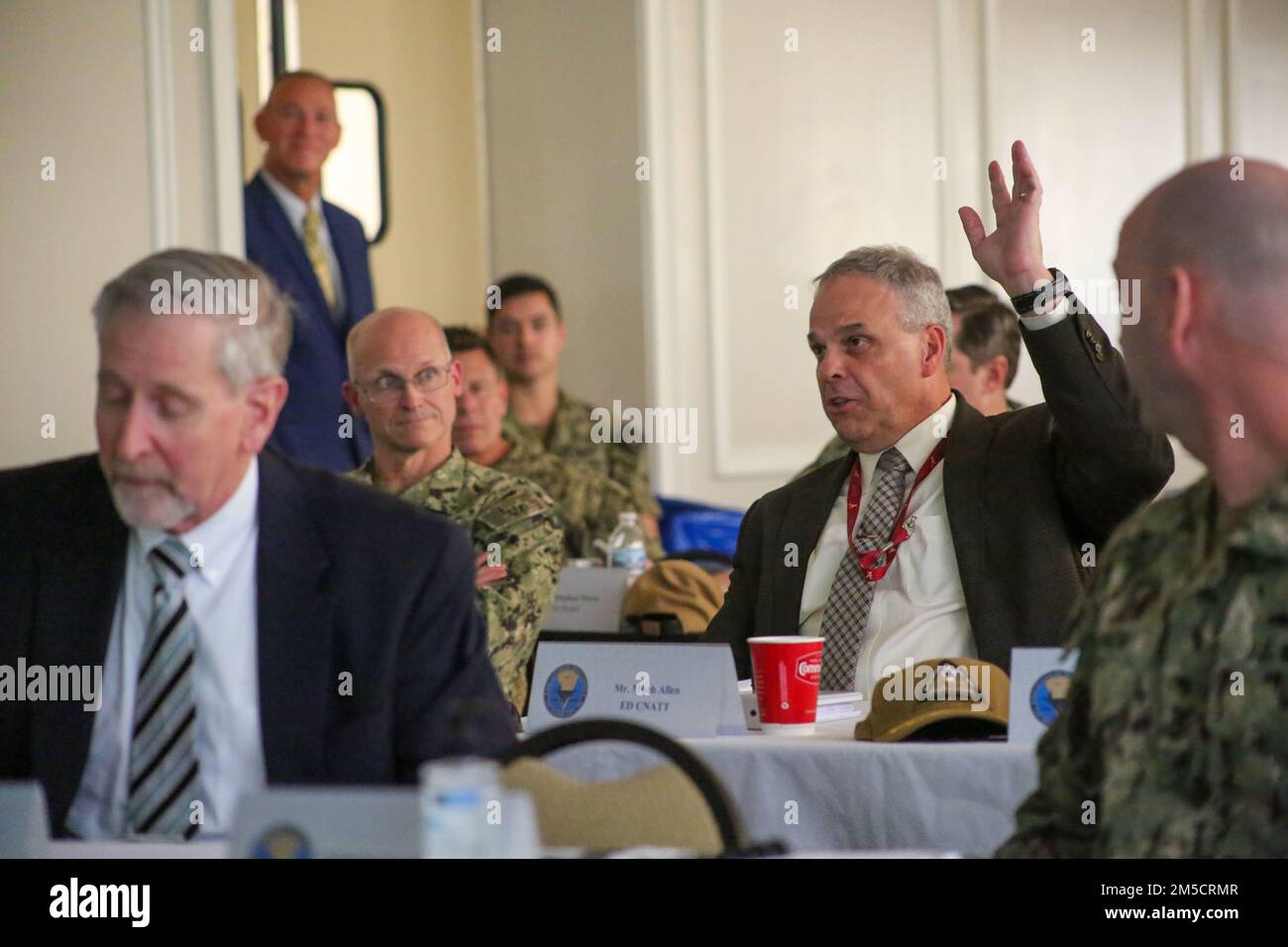 PENSACOLA, Fla. (March 2, 2022) Mitch Allen, executive director, Center for Naval Aviation Technical Training, offers feedback during an out-brief presentation at the Naval Education and Training Command (NETC) spring offsite at Naval Air Station Pensacola.  The meeting was an opportunity for NETC/MyNavy HR Force Development domain leadership to discuss a range of priorities and issues spanning across the “street to fleet” mission of recruiting, training and delivering combat-ready warfighters to the fleet. Stock Photo