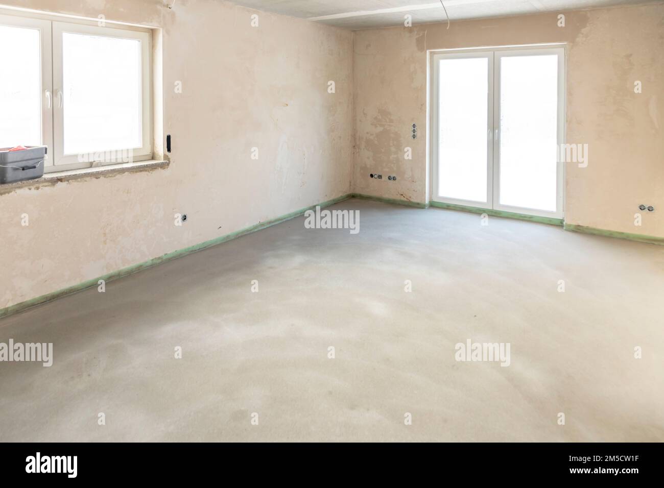 new house with plaster wall and estrich at the floor in raW CONDITION