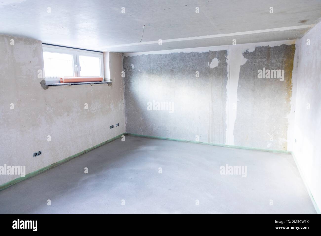 new house with plaster wall and estrich at the floor in raW CONDITION