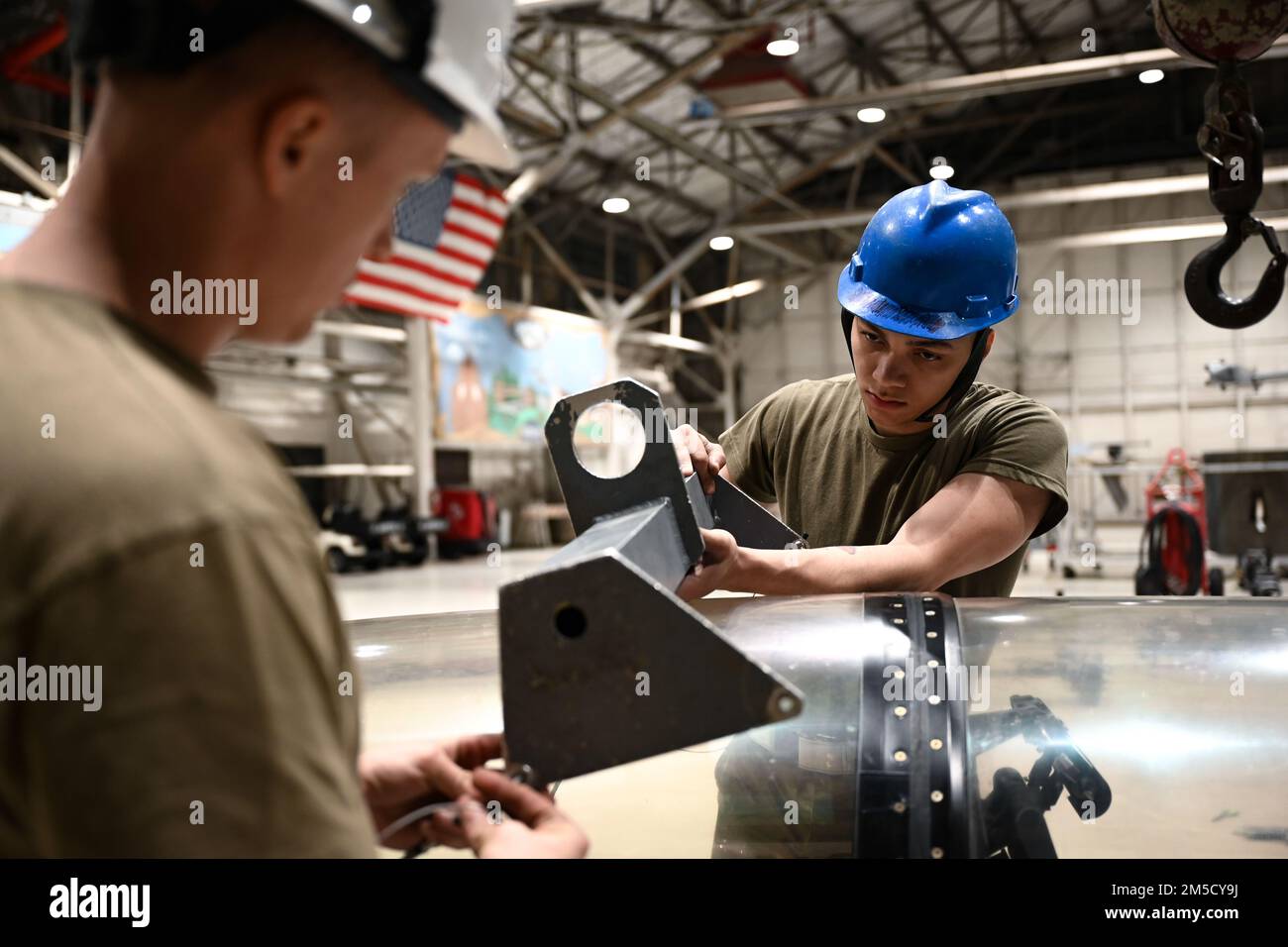 20th Component Maintenance Squadron egress Airmen attach a crane to the