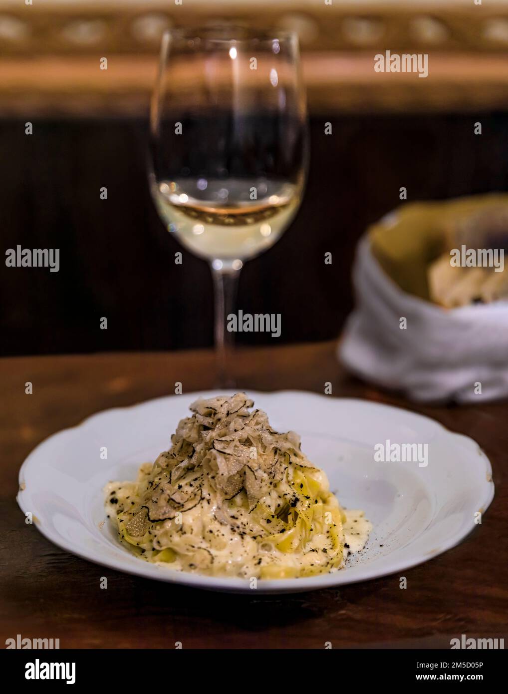 Fresh pasta with truffle sauce, cooked in a pecorino cheese wheel with