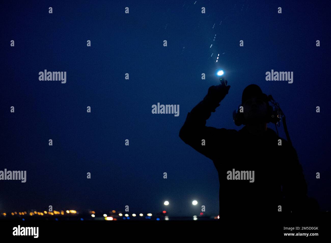 Senior Airman Justin Ely, a C-5M Super Galaxy flying crew chief assigned to the 436th Aircraft Maintenance Squadron, performs a post-flight inspection at Incirlik Air Base, Turkey, March 2, 2022. The C-5 stopped through the 521st Air Mobility Operations Wing node for training. During this training, the wing’s 728th Air Mobility Squadron exercised multi-capable airmen skills and agile combat employment concepts with the largest aircraft in the Department of Defense inventory. Stock Photo