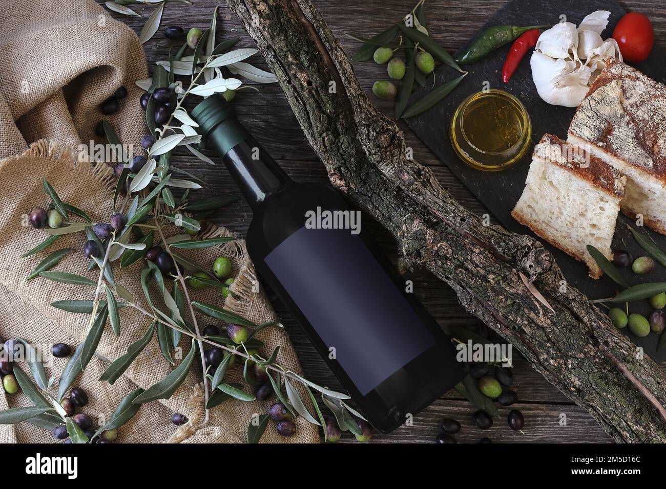 Bottle olive oil bread garlic chili Stock Photo Alamy
