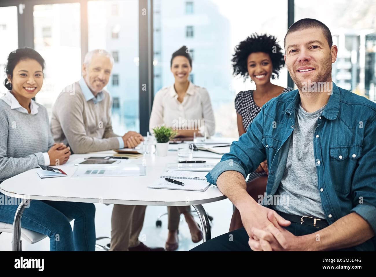 Theyre a team of innovators. Portrait of a group of colleagues sitting ...
