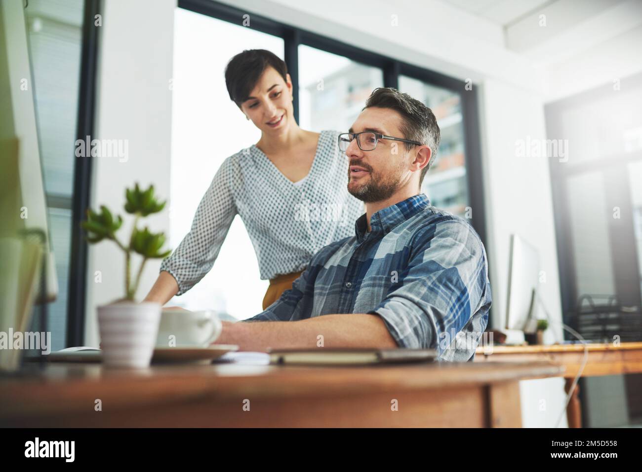 The creative and dynamic duo at work. Cropped of colleagues working ...