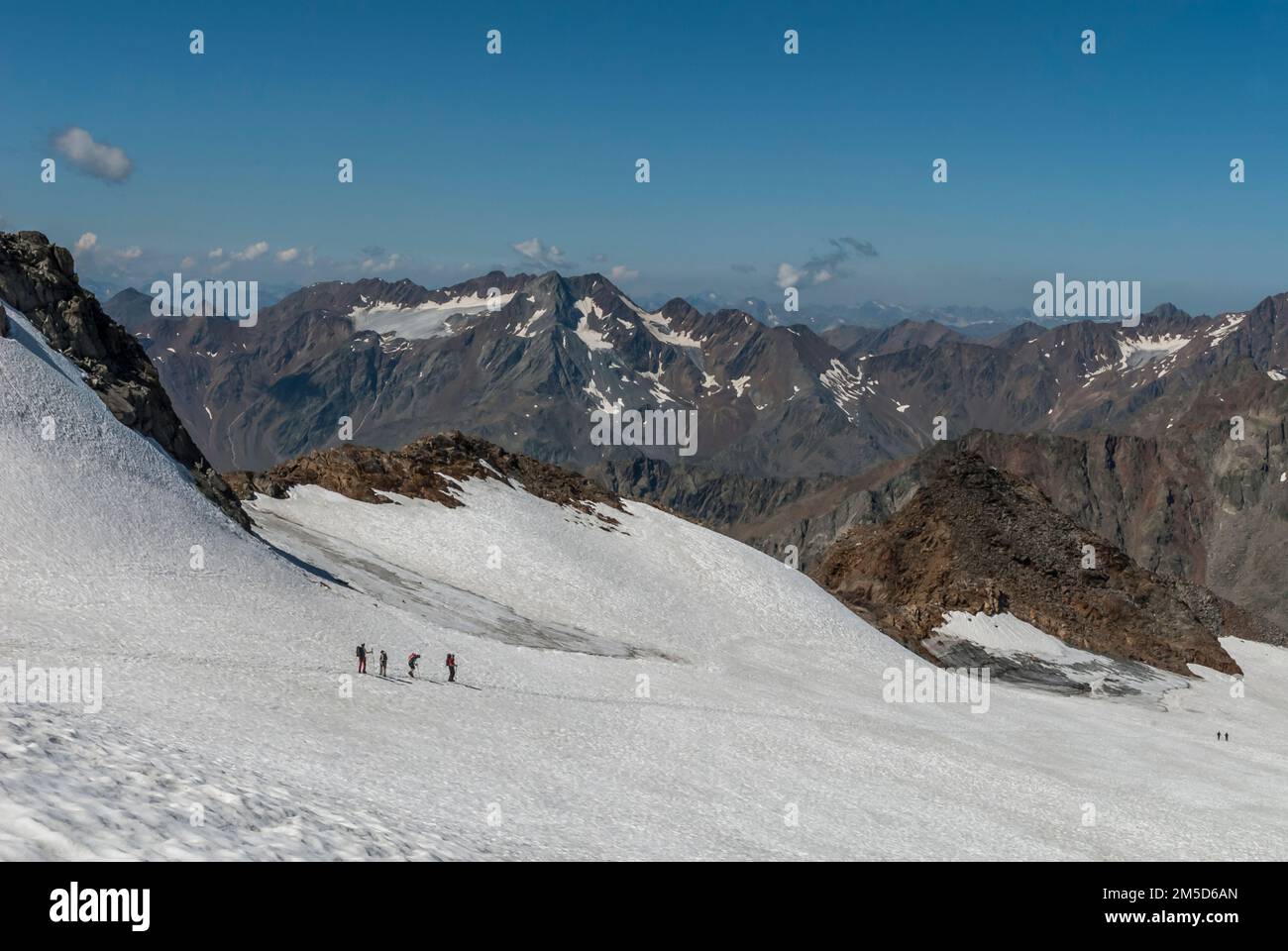 The image is of mountaineers climbing the Similaun mountain from the
