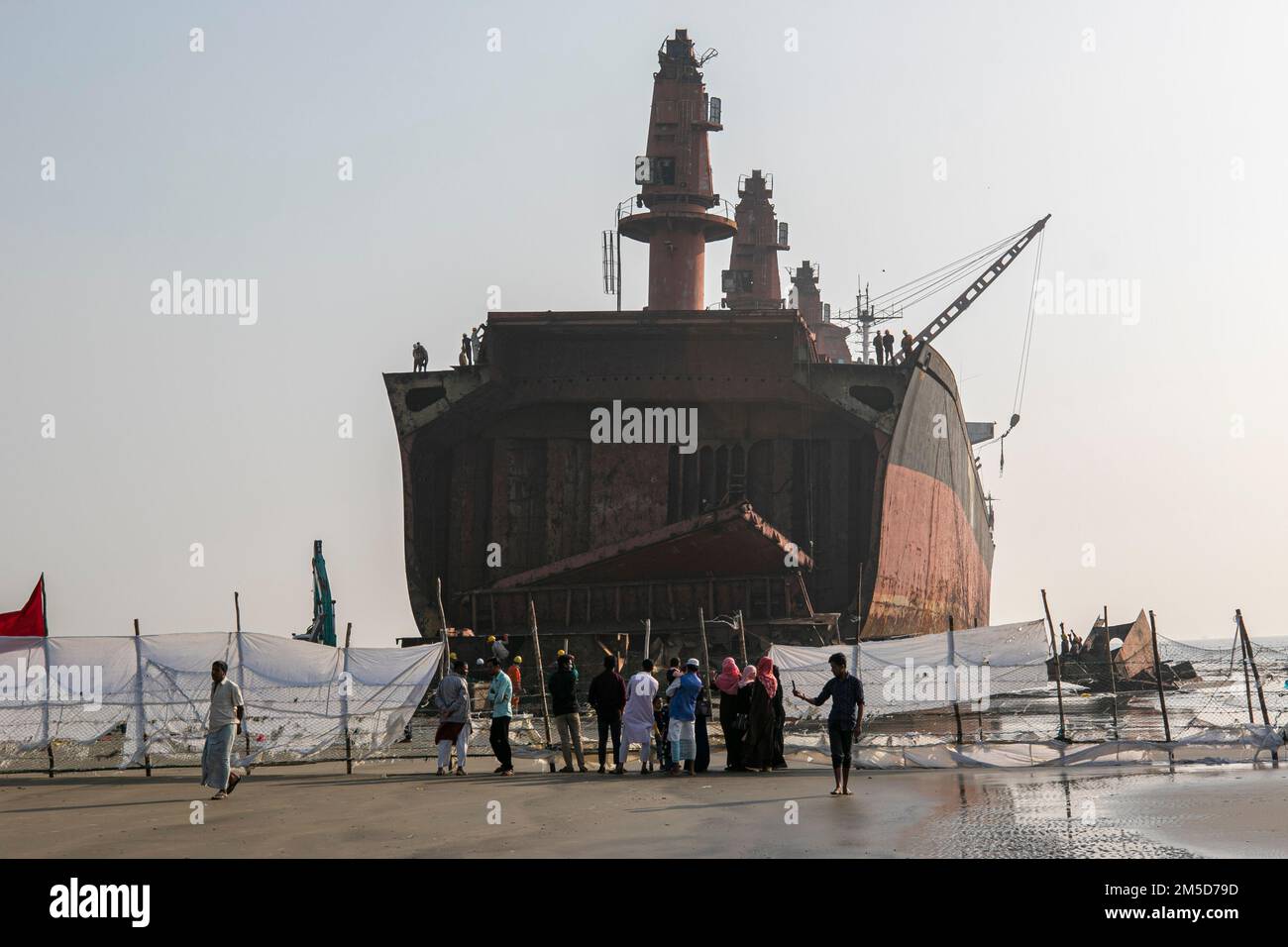 Ship Breaking Yard, Chattogram, Bngladesh, 20 Dec 2021  People watching the work of cutting old ships. Stock Photo