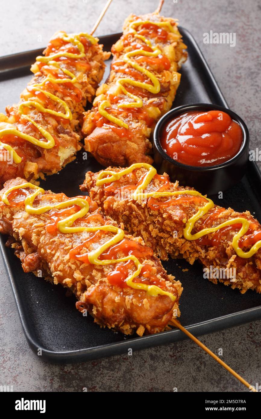 Korean corn dogs are made from sausage, mozzarella cheese on skewer and