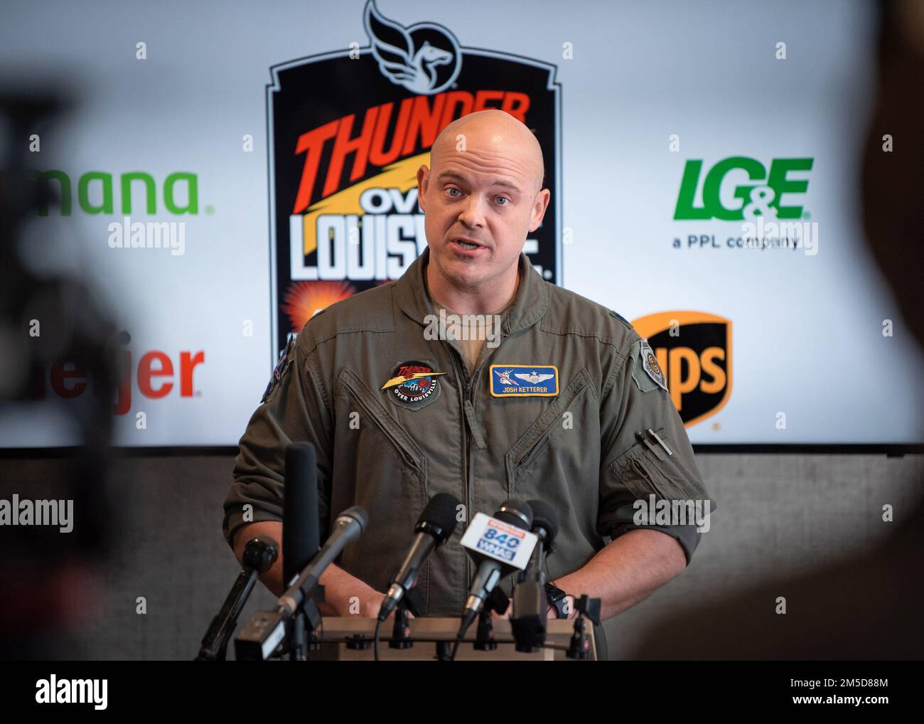 Lt. Col. Josh Ketterer, a pilot in the Kentucky Air National Guard, discusses the lineup of military aircraft slated to perform in the 2022 Thunder Over Louisville air show during a press conference held in Louisville, Ky., March 3, 2022. The event will return to the banks of the Ohio River after a two-year absence and is expected to feature dozens of planes, including the U.S. Air Force F-22 Raptor Demo Team and a brand-new C-130J Super Hercules from the Kentucky Air Guard. This year’s show celebrates the 75th anniversary of the United States Air Force. Stock Photo