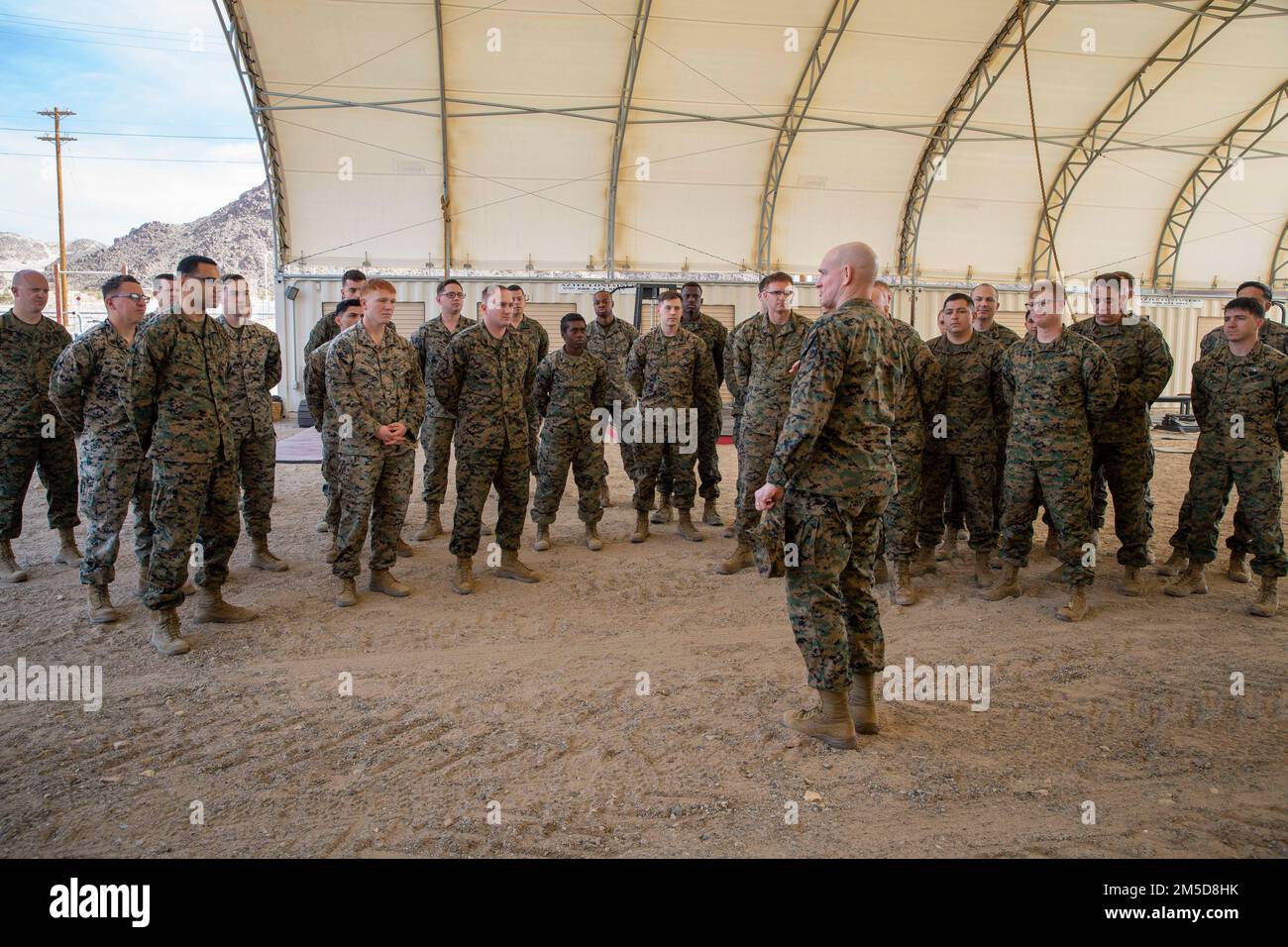 U.S. Marine Corps Sgt. Maj. Troy E. Black, the 19th Sergeant Major of the Marine Corps, tours the Marine Corps Tactics and Operations Group (MCTOG) at Marine Corps Air Ground Combat Center, Twentynine Palms, March 3, 2022. The work conducted by the Marines at MCTOG directly impacts Force Design 2030 decisions. MCTOG leads ground combat element (GCE) doctrine and training standard development and refinement, and examines emerging concepts and technology in order to enhance GCE operational readiness and interoperability in support of the Marine Air-Ground Task Force. Stock Photo