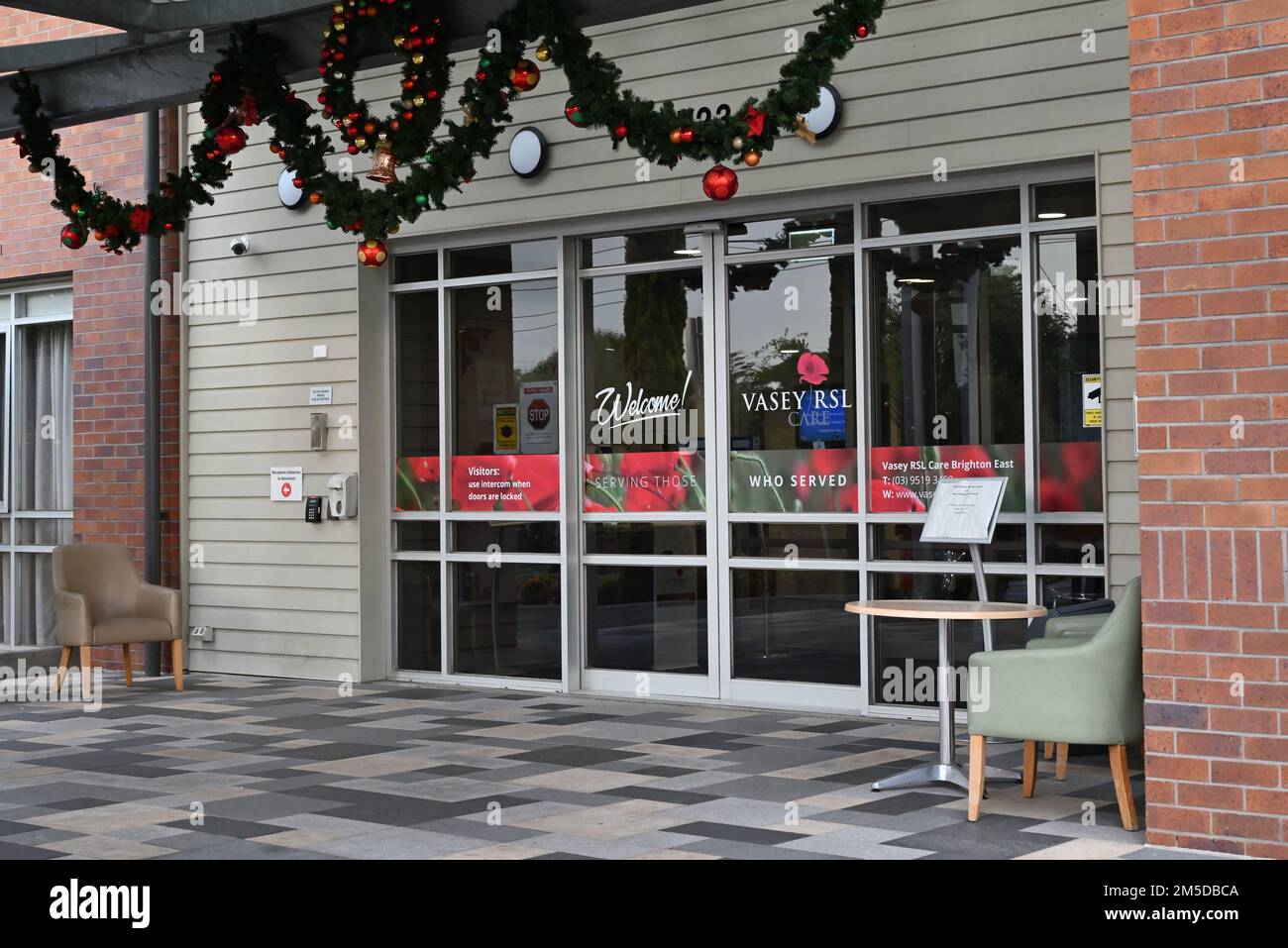 Front entrance to Vasey RSL Care, located on Hawthorn Rd, with Christmas decorations above the doorway Stock Photo