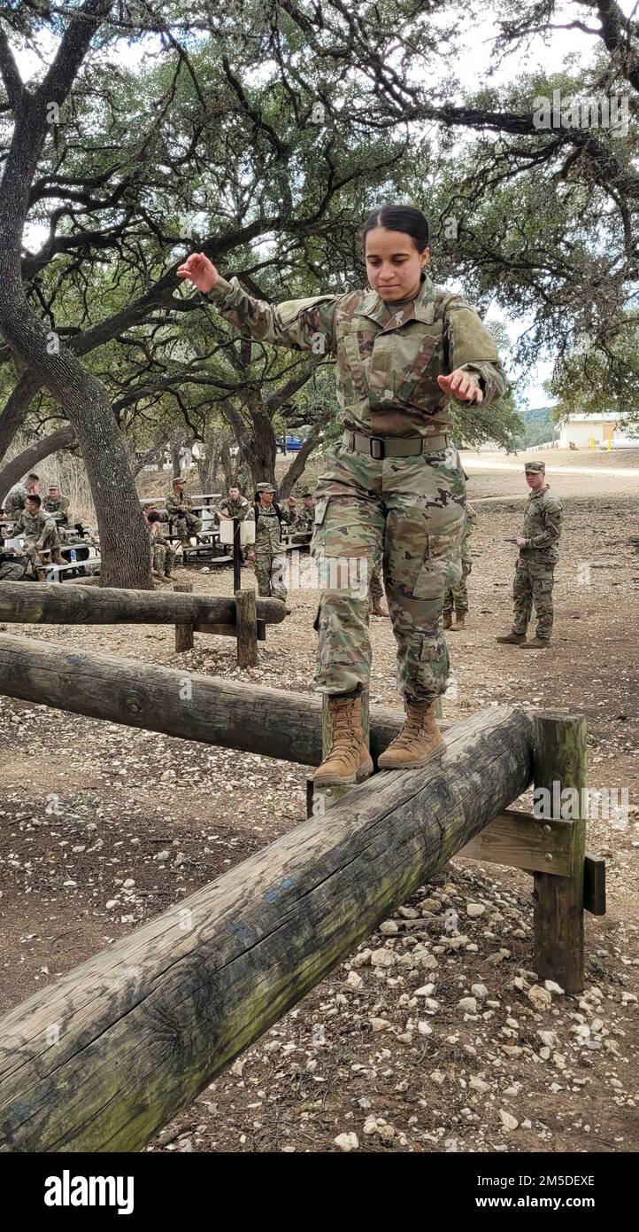 Spc. Isabel Jaime, a trumpet player with the 99th Readiness Division’s 78th Army Band, competes in the FY22 Consortium Best Warrior Competition March 3-6 at Camp Bullis on Joint Base San Antonio, Texas. The FY22 Consortium Best Warrior Competition kicked off with a 12-mile road march and is challenging Soldiers with tasks such as qualification with various weapons, the Army Combat Fitness Test, water survival, obstacle course, land navigation and urban warfare. The CBWC is a joint event featuring Soldiers belonging to several Army Reserve Commands from across the nation, to include the 80th Tr Stock Photo