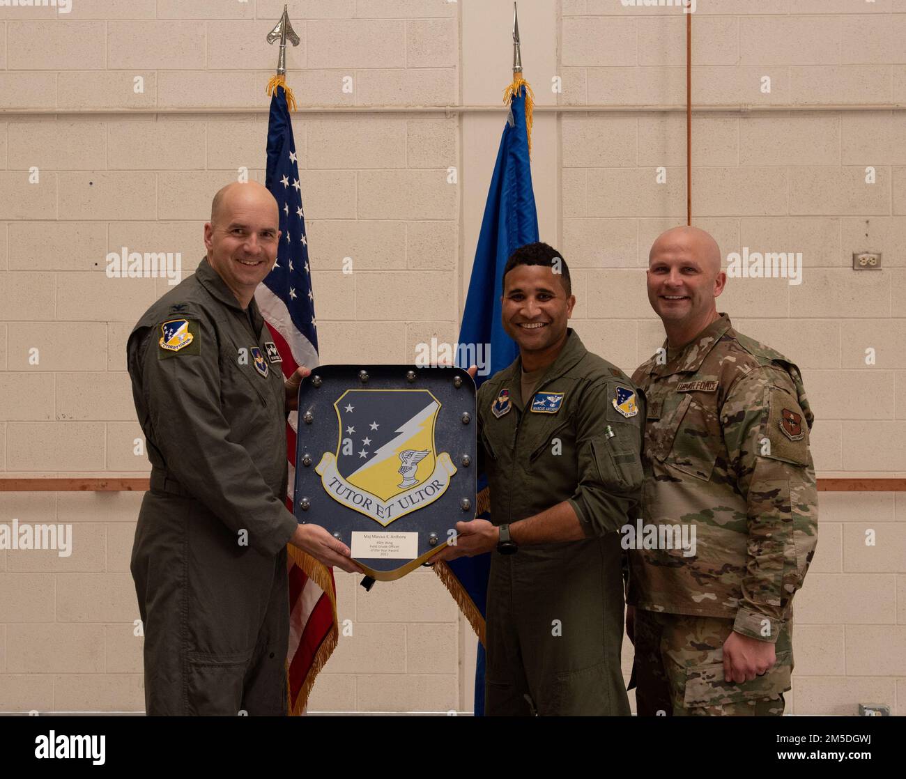 Maj. Marcus Anthony, 49th Operations Group annual award winner, accepts ...