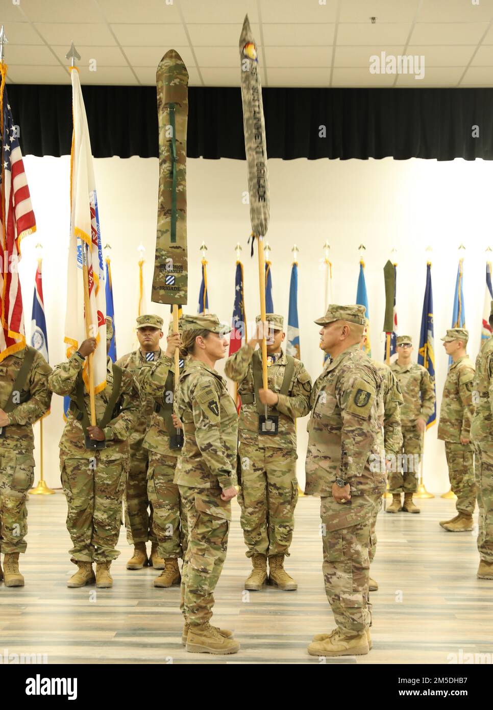 Col. Carrie L. Perez and Command Sgt. Maj. Ernesto Castillo of 36th Sustainment Brigade Accepted authority from 3rd Division Sustainment Brigade, 3rd Infantry Division’s Col. David Key and Command Sgt. Maj. Denice Malave by hosting a Transfer of Authority Ceremony on March 04, 2022 on Camp Arifjan, Kuwait. Stock Photo