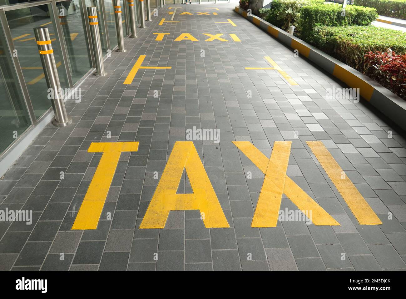 taxi stand sign on road black in singapore Stock Photo Alamy