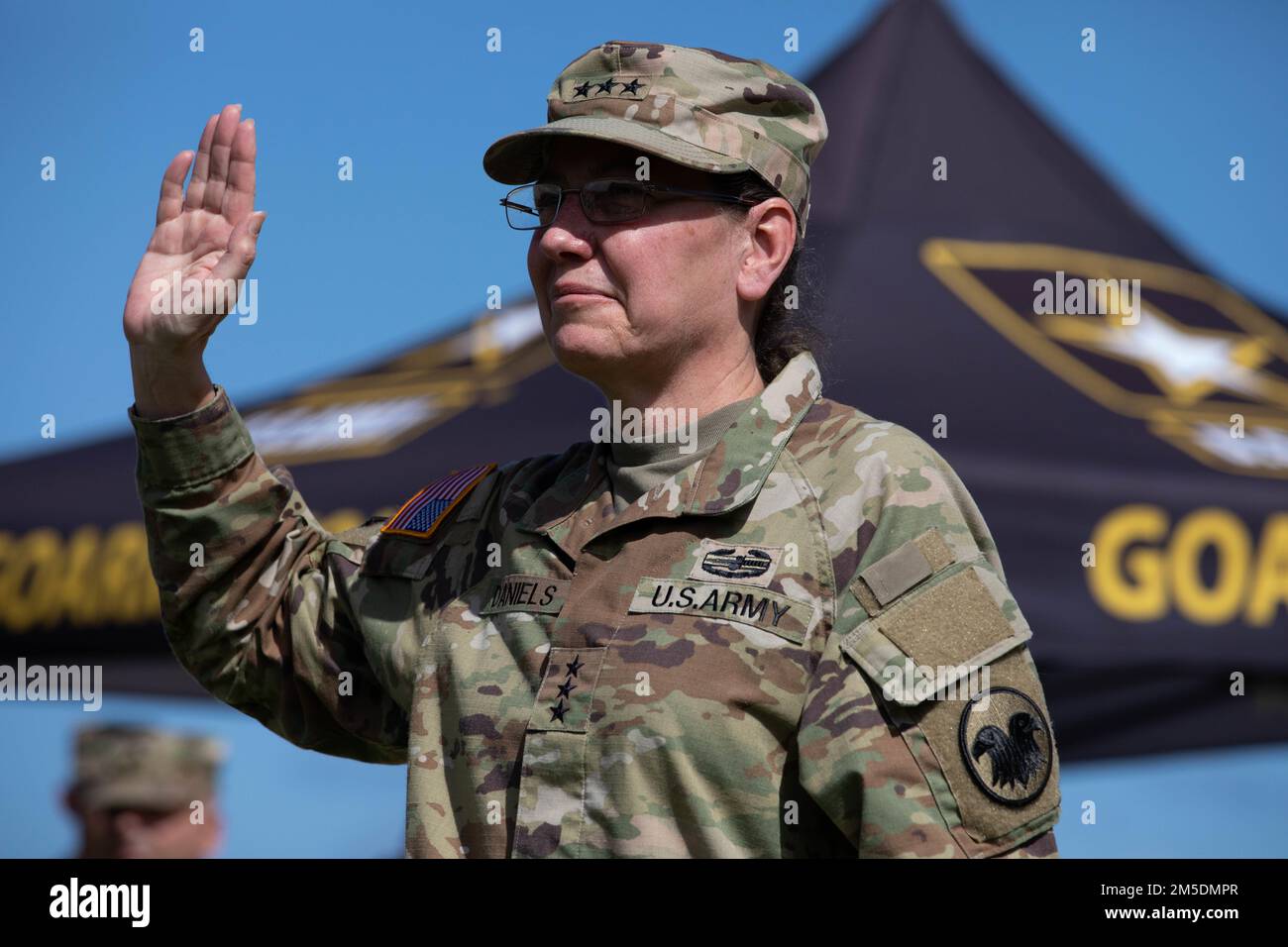 SAN JUAN, Puerto Rico—Chief of Army Reserve Lt. Gen. Jody J. Daniels, commanding general of the U.S. Army Reserve Command, administers the Oath of Enlistment to 48 future soldiers at the historic Castillo San Cristobal, Puerto Rico , March 5, 2022. Stock Photo
