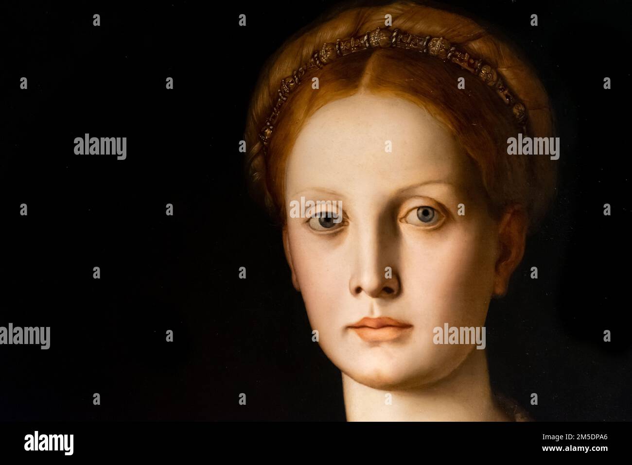 Close-up on medieval portrait of red haired noblewoman Stock Photo